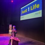 Presenter speaking to students at the Just 1 Life programme.